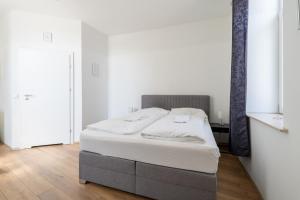 Postel nebo postele na pokoji v ubytování FarawayHomes Studios 43