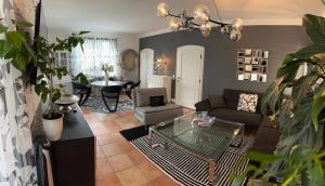 Posezení v ubytování Wohnung 5 mit Garten und sonniger Terrasse
