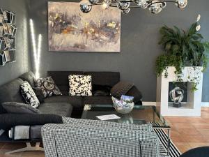 Posezení v ubytování Wohnung 5 mit Garten und sonniger Terrasse