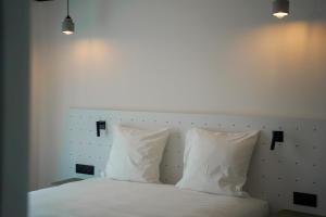 All Suites Appart Hôtel et Hôtel - Paris 13 - Porte d'Italie客房内的一张或多张床位