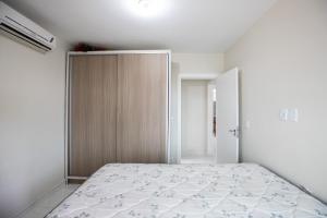 Postel nebo postele na pokoji v ubytování Dante Aliguieri - 104 - Dois Quartos