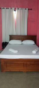Postel nebo postele na pokoji v ubytování Roo Lanka Homestay