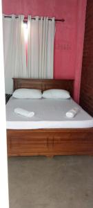 Postel nebo postele na pokoji v ubytování Roo Lanka Homestay