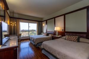 Cama ou camas em um quarto em Bourbon Thermas Eco Resort Cataratas do Iguacu