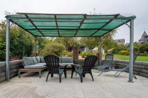 Patio nebo venkovní prostory v ubytování Gîte La Maison Jaune