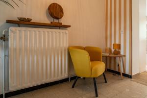 Posezení v ubytování Gîte La Maison Jaune