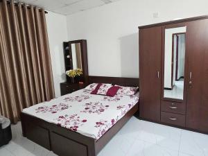 En eller flere senge i et værelse på Hope Holiday Resort