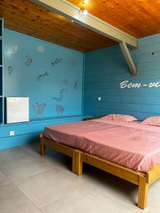 Postel nebo postele na pokoji v ubytování Casa Madeira
