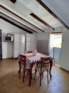 a dining room with a table and chairs at casa eras irene in Moratalla +45 photos