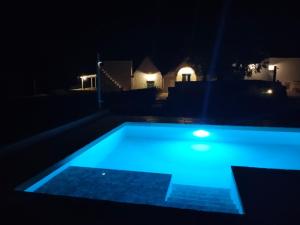 Bazén v ubytování Trullo Dimora Podere Papilio nebo v jeho okolí