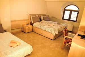 Letto o letti in una camera di City SMART