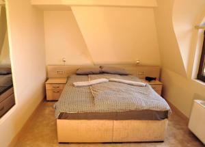 Letto o letti in una camera di City SMART