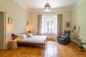Postel nebo postele na pokoji v ubytování Fara Bošín