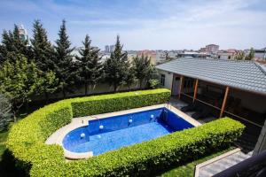 an overhead view of a backyard with a swimming pool at Villa near Nizami Street in Baku