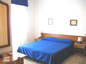 Posteľ alebo postele v izbe v ubytovaní B&B Garnì Da Vito