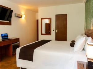Letto o letti in una camera di Hotel Ferré Machu Picchu