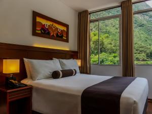 Letto o letti in una camera di Hotel Ferré Machu Picchu