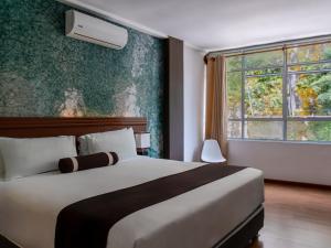 Letto o letti in una camera di Hotel Ferré Machu Picchu
