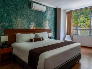 Letto o letti in una camera di Hotel Ferré Machu Picchu