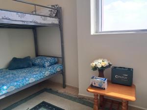 Postel nebo postele na pokoji v ubytování Top House Hostel