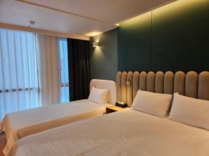 Postel nebo postele na pokoji v ubytování #Elbon The Stay