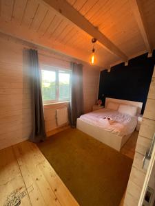Postel nebo postele na pokoji v ubytování West Wicklow 5 person Cabin