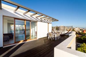 En balkong eller terrasse på La Terrazza Di Olimpia
