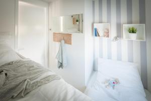 Postel nebo postele na pokoji v ubytování Hausboot "See-Treff"