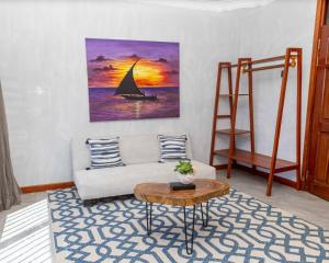 Ένα ή περισσότερα κρεβάτια σε δωμάτιο στο Kichangani Beach House +27 φωτογραφίες