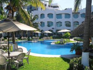 Bazén v ubytování Playa Caracol Hotel & Spa nebo v jeho okolí