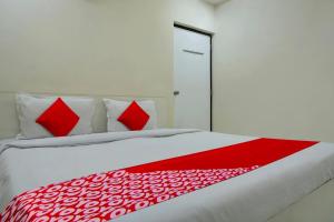 Postel nebo postele na pokoji v ubytování Hotel O B Happy Homely Stay + 22 fotografií