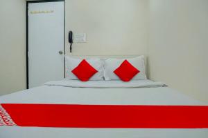 Postel nebo postele na pokoji v ubytování Hotel O B Happy Homely Stay