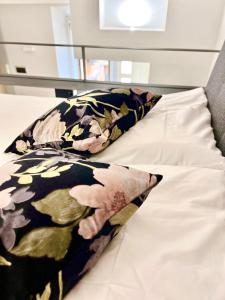 Una cama o camas en una habitación de Silla Studiò - piccolo appartamento a due passi dal Vaticano