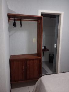 Postel nebo postele na pokoji v ubytování Flat Lugar dos Sonhos + 1 fotografie