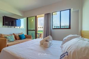 Katil atau katil-katil dalam bilik di Makia Beach #C209 - Muro Alto por Carpediem +38 gambar