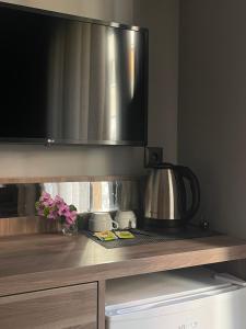 Kuchyň nebo kuchyňský kout v ubytování Viola Hotel Budva