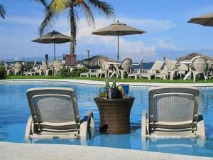 Bazén v ubytování Playa Caracol Hotel & Spa nebo v jeho okolí
