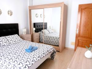 Postel nebo postele na pokoji v ubytování City Centre Arrecife