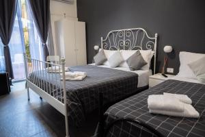 A bed or beds in a room at B&B Verga