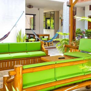 Posezení v ubytování Hostal Laurita Beach