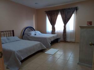 Katil atau katil-katil dalam bilik di Casa con Alberca los Amates +20 gambar
