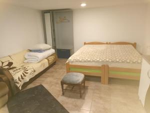 Voodi või voodid majutusasutuse Marija apartmani toas