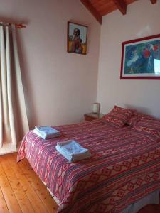 Postel nebo postele na pokoji v ubytování Residencia en Bariloche con vista al Cerro Otto