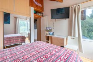 Postel nebo postele na pokoji v ubytování Residencia en Bariloche con vista al Cerro Otto