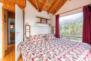 Postel nebo postele na pokoji v ubytování Residencia en Bariloche con vista al Cerro Otto