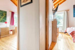 Postel nebo postele na pokoji v ubytování Residencia en Bariloche con vista al Cerro Otto