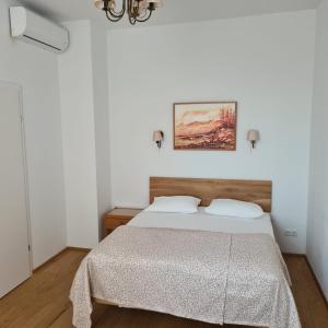 Postel nebo postele na pokoji v ubytování Villa Musik - apartments in historical Villa , Baden