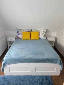 Postel nebo postele na pokoji v ubytování Marica Apartman