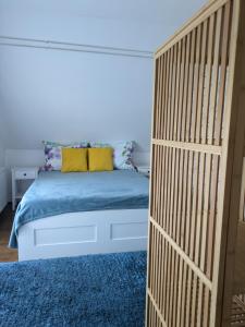 Postel nebo postele na pokoji v ubytování Marica Apartman