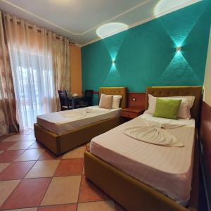 Postel nebo postele na pokoji v ubytování My Rooms Hotel